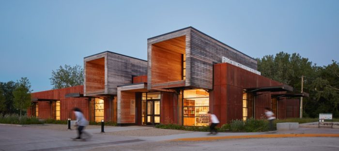 triple house by superhelix unfolds three successive gabled units clad in red cedar